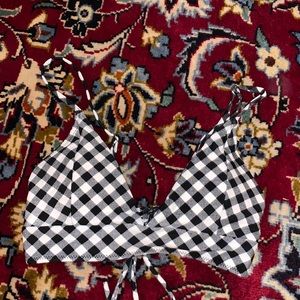 A black and white plaid bikini top